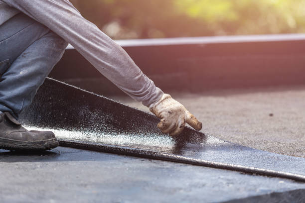 Professional Exterior Waterproofing technician working in Belleville, KS